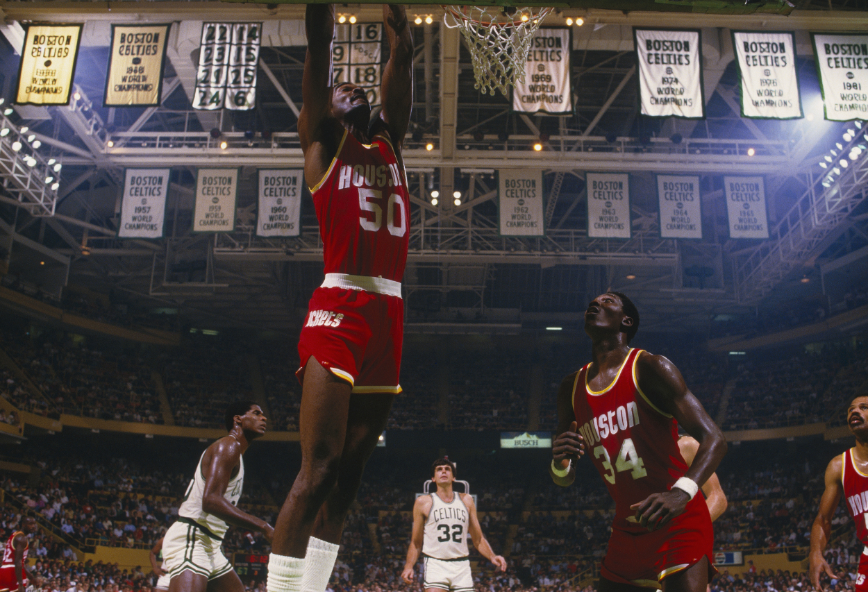 Ralph Sampson dunks against the Boston Celtics.