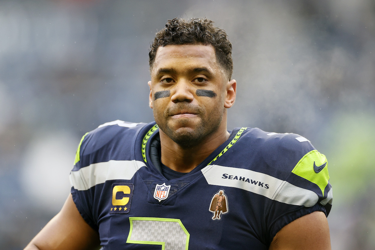 Russell Wilson of the Seattle Seahawks looks on before the game against the Detroit Lions at Lumen Field on January 02, 2022 in Seattle, Washington.