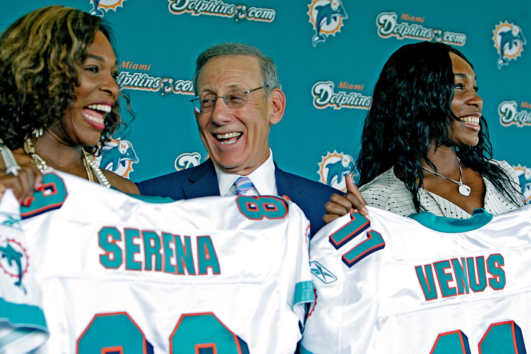 Serena and Venus Williams with Miami Dolphins owner Stephen Ross after the tennis pros ownership stake in the NFL team