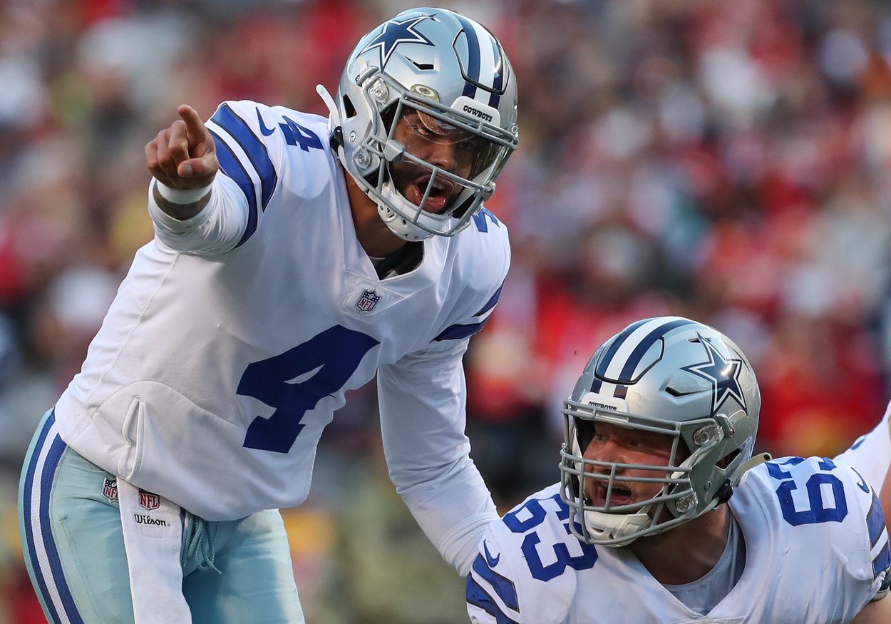 Dallas Cowboys quarterback Dak Prescott (L) and center Tyler Biasadz in 2021.