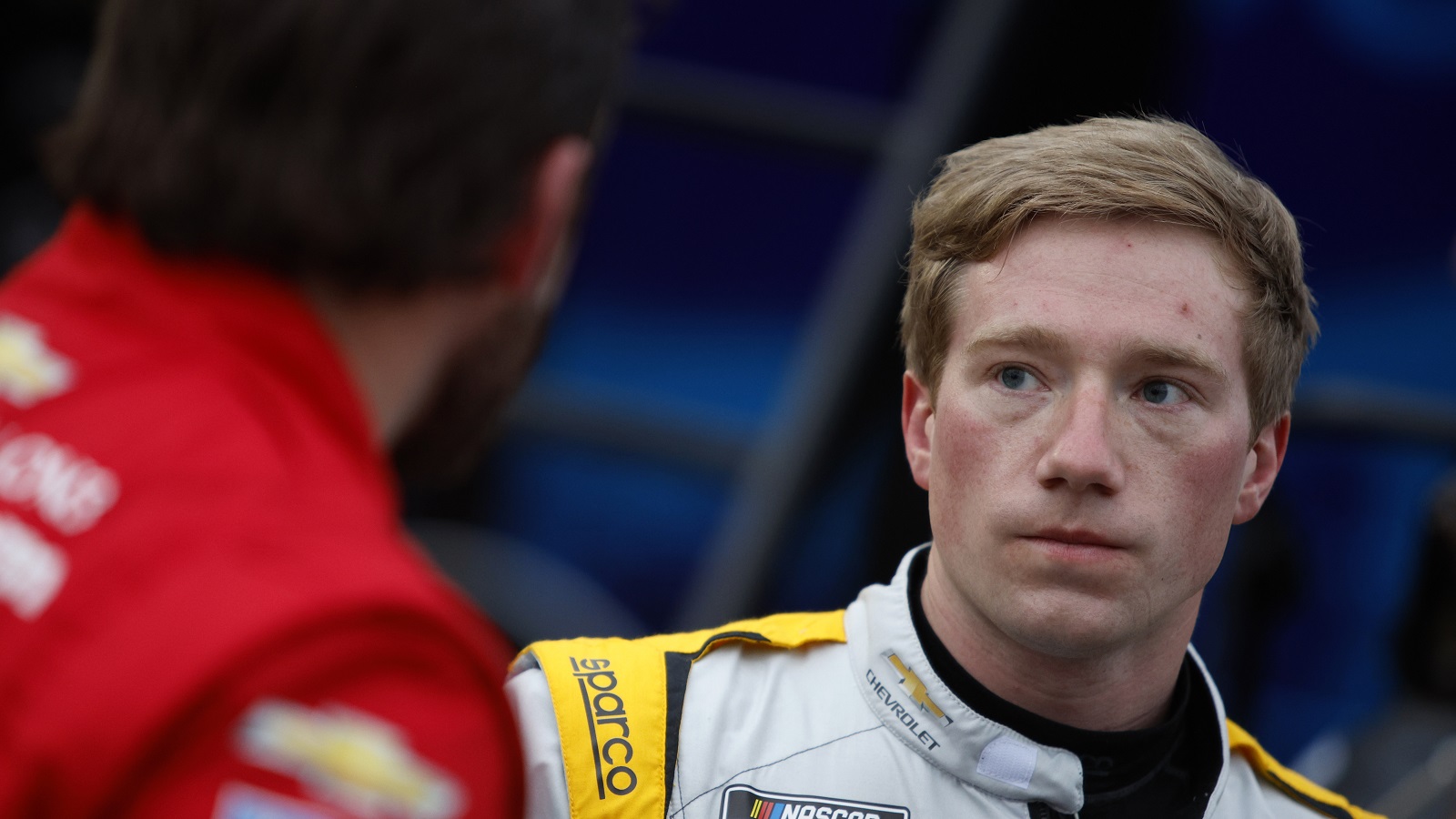 Tyler Reddick, driver of the No. 8 Chevrolet, looks on in the garage area during practice for the NASCAR Cup Series Daytona 500 on Feb. 15, 2022, in Daytona Beach, Florida. | Sean Gardner/Getty Images