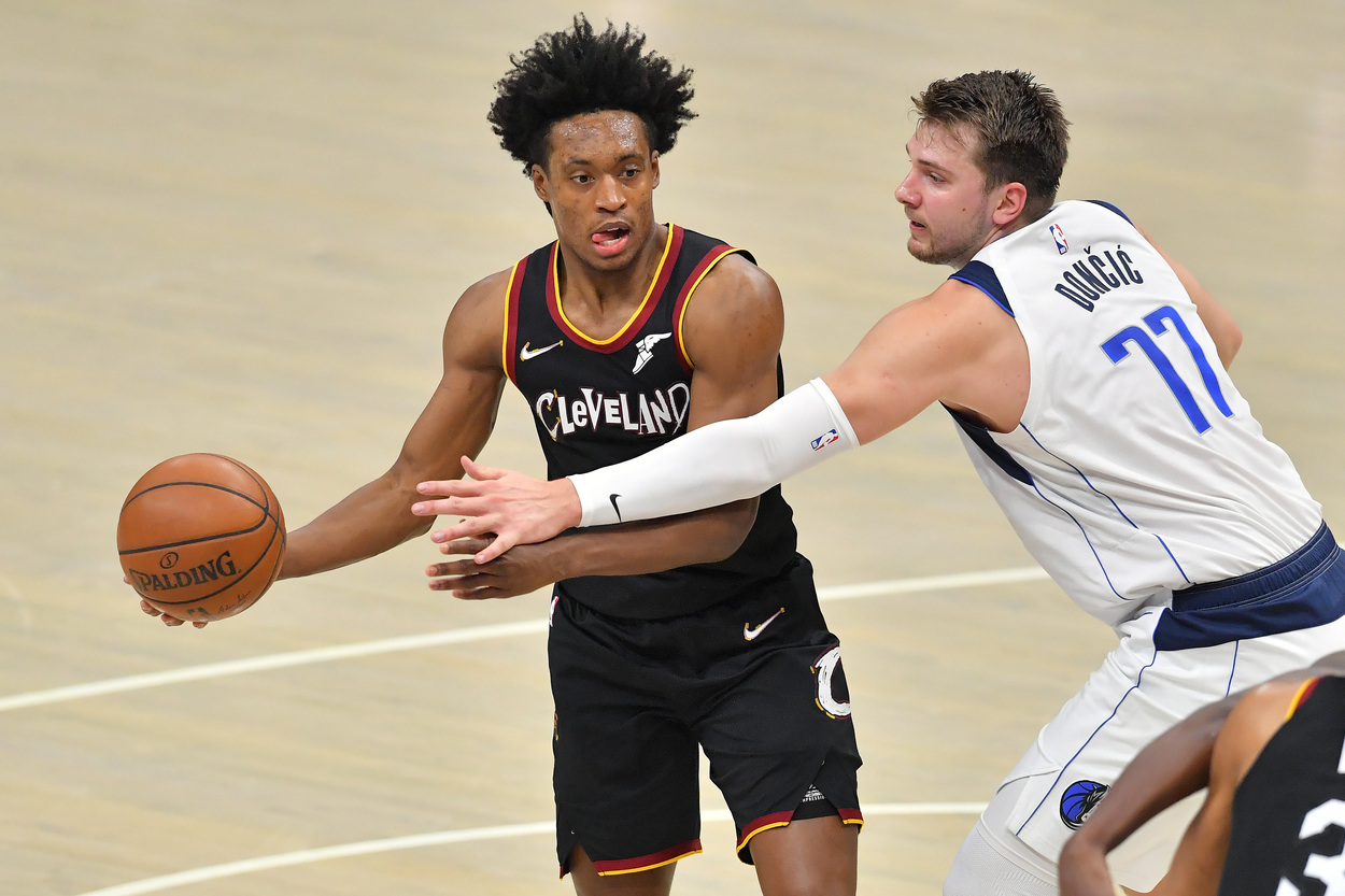 Dallas Mavericks star Luka Doncic tries to guard Cleveland Cavaliers' ball-handler Collin Sexton.