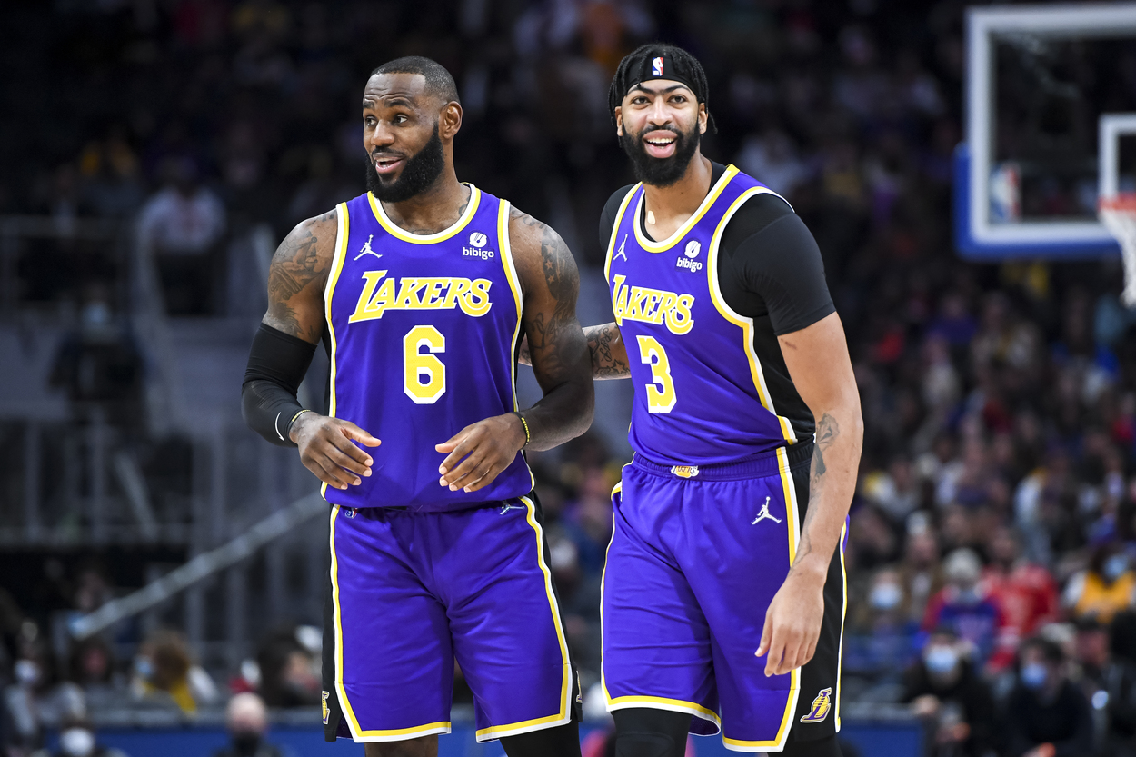 Los Angeles Lakers teammates LeBron James and Anthony Davis smile on the court.