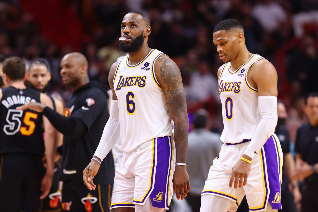 Los Angeles Lakers stars LeBron James and Russell Westbrook walk off the court.