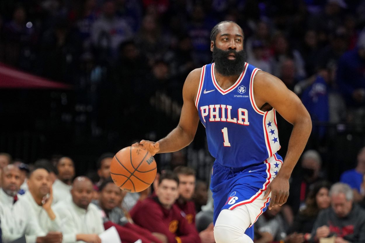 Philadelphia 76ers guard James Harden dribbles the ball up the court against the Cleveland Cavaliers.