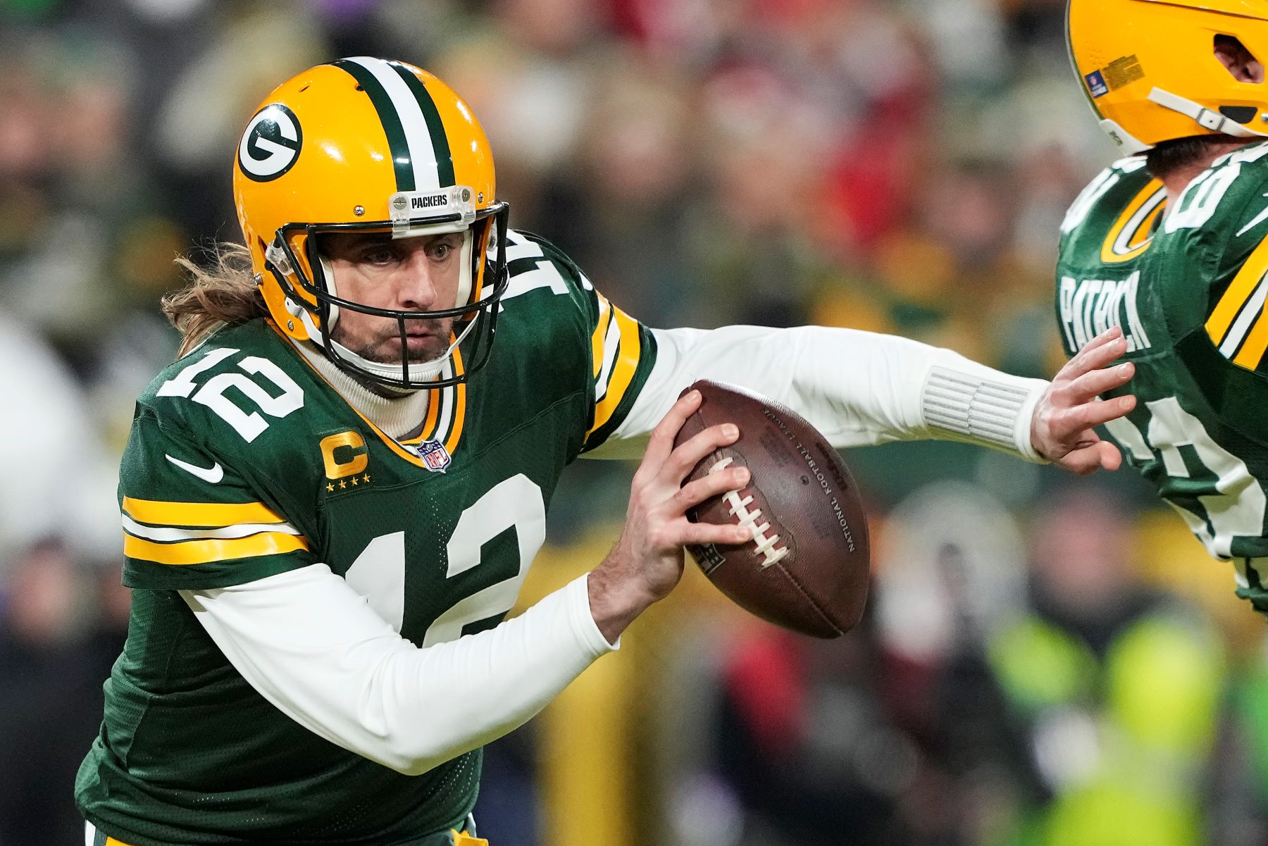 Quarterback Aaron Rodgers as #12 of the Green Bay Packers NFL team during a game against the San Francisco 49ers