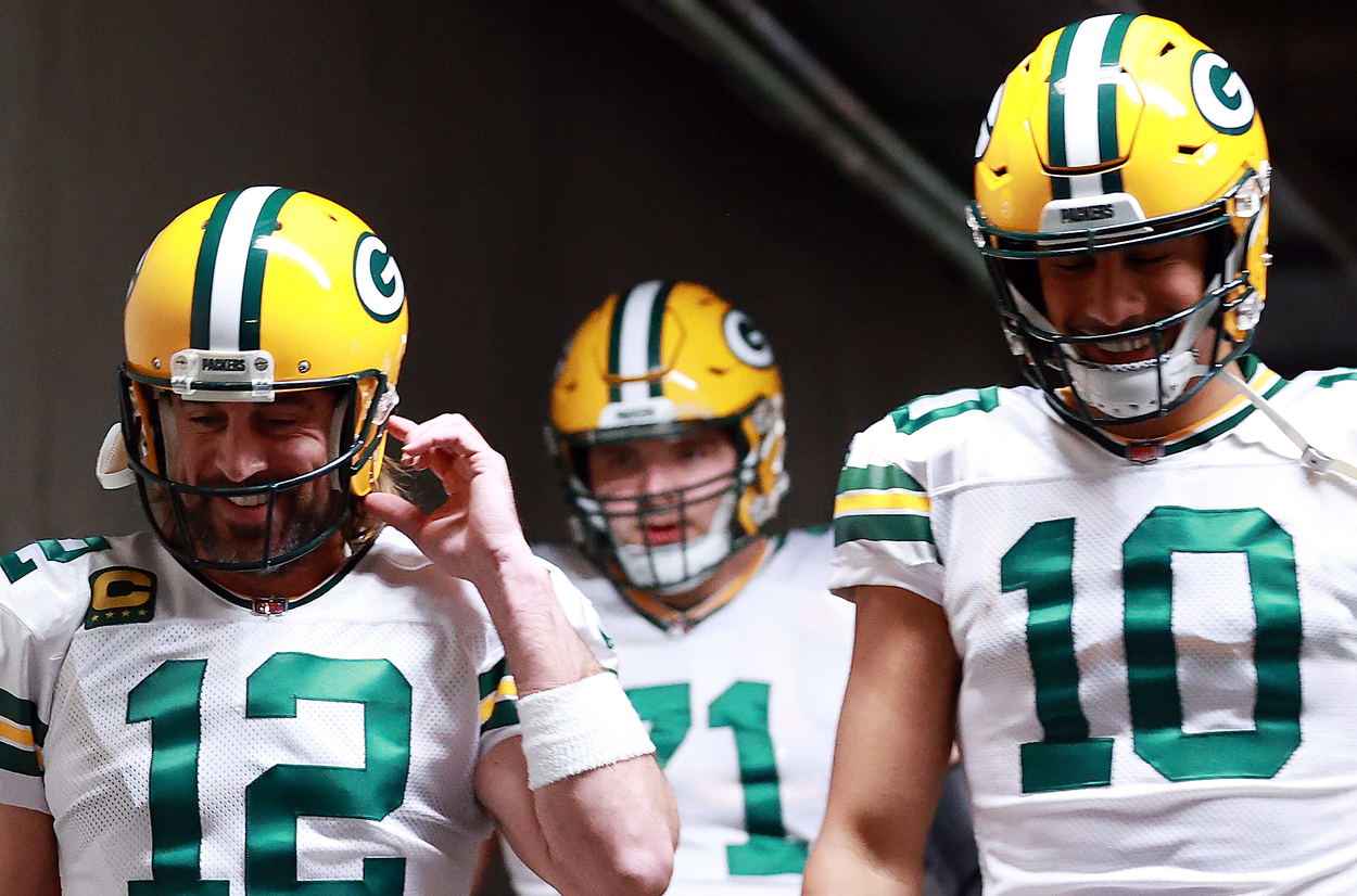 Green Bay Packers quarterbacks Aaron Rodgers (L) and Jordan Love in 2021.