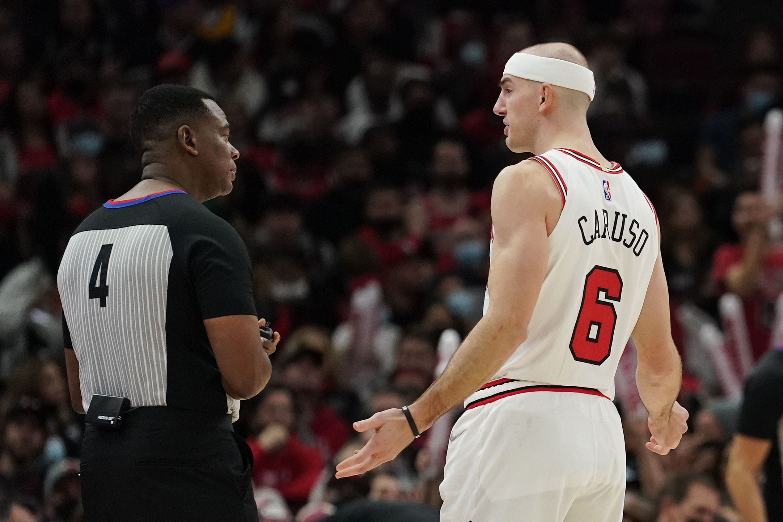 Chicago Bulls guard Alex Caruso argues with an official during an NBA game in November 2021