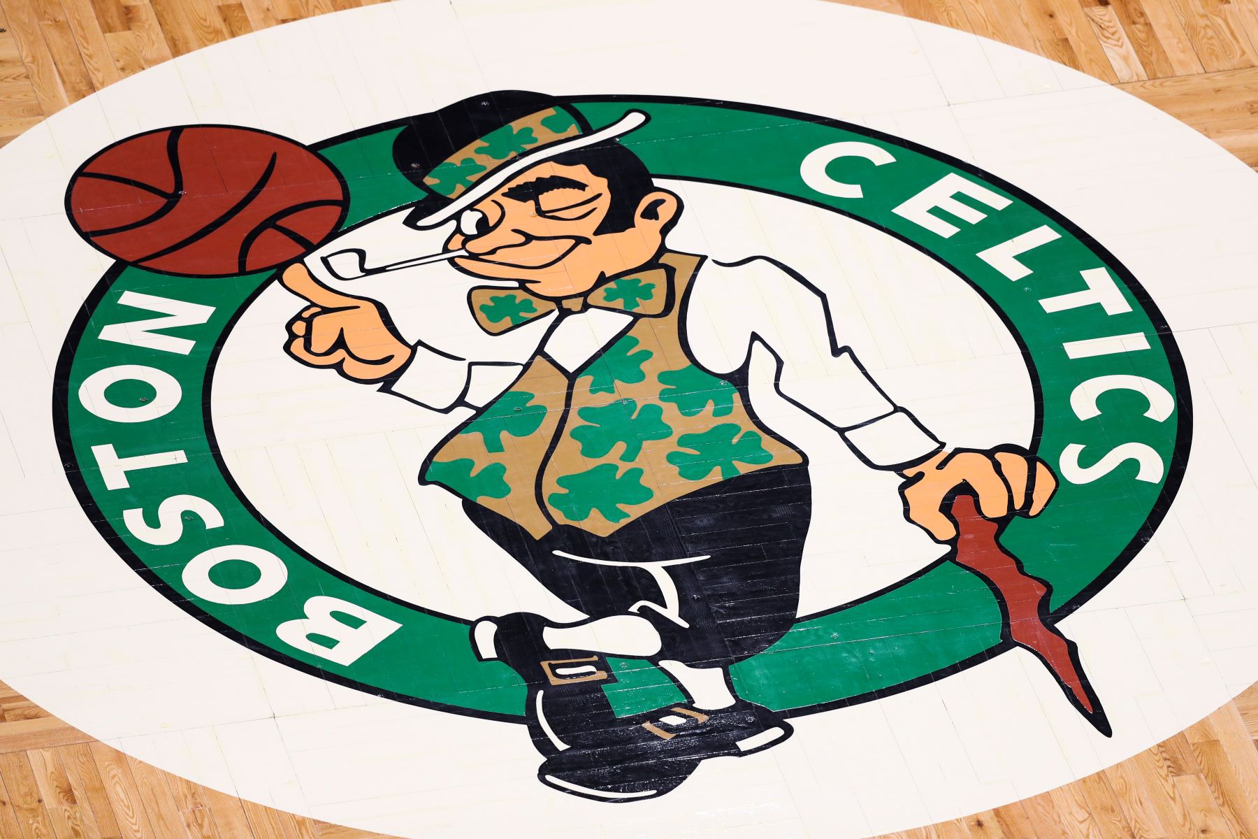 NBA team Boston Celtics logo on the court during a game against the Charlotte Hornets