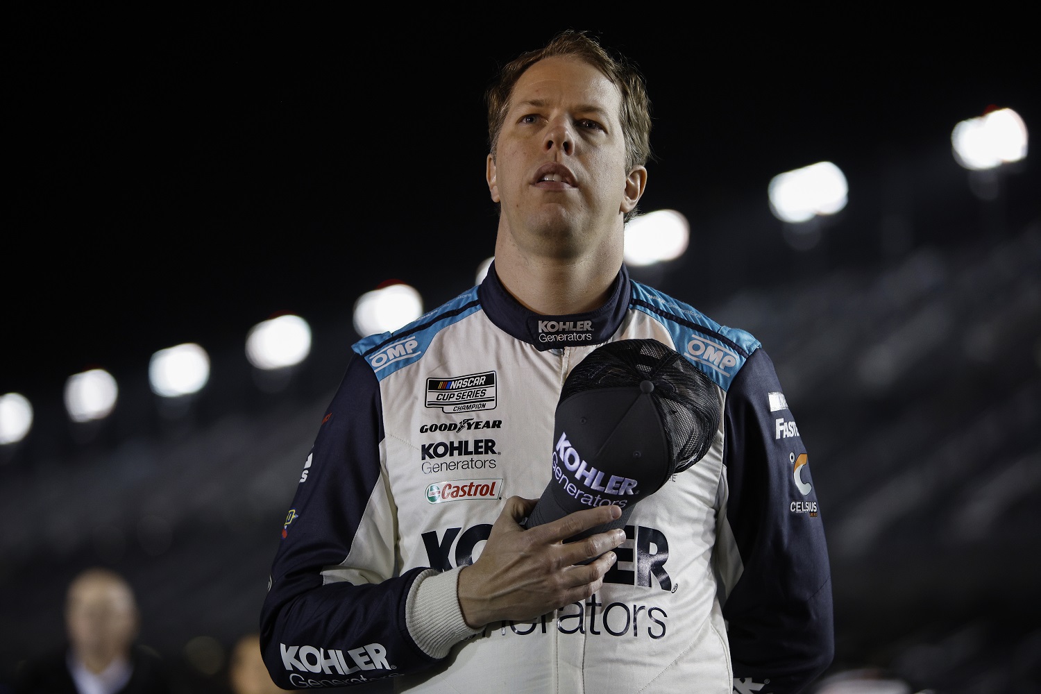 Brad Keselowski stands during the national anthem prior to qualifying for the NASCAR Cup Series Daytona 500 at Daytona International Speedway on Feb. 16, 2022.