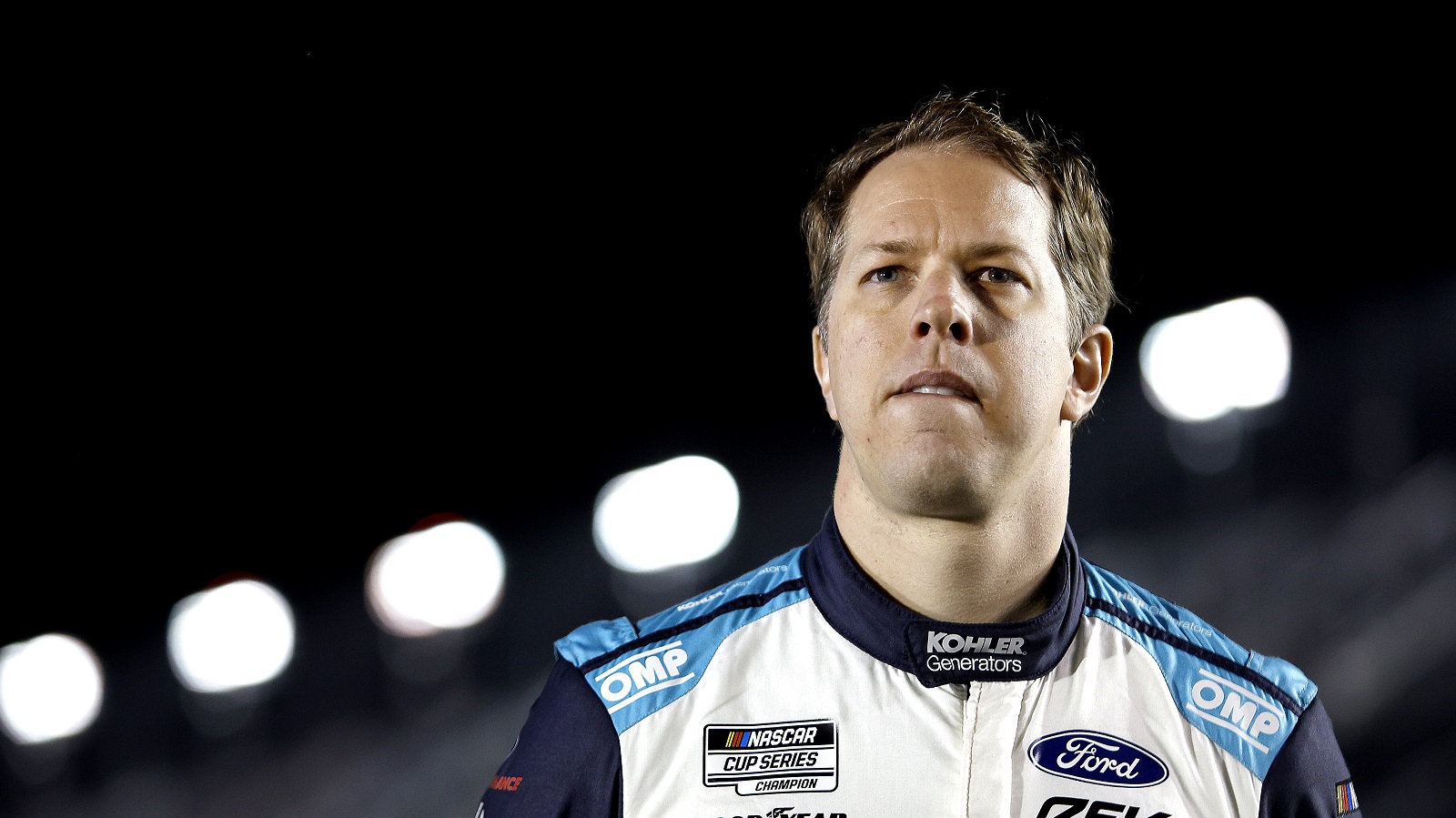 Brad Keselowski stands on the grid during qualifying for the NASCAR Cup Series Daytona 500 on Feb. 16, 2022. | Sean Gardner/Getty Images