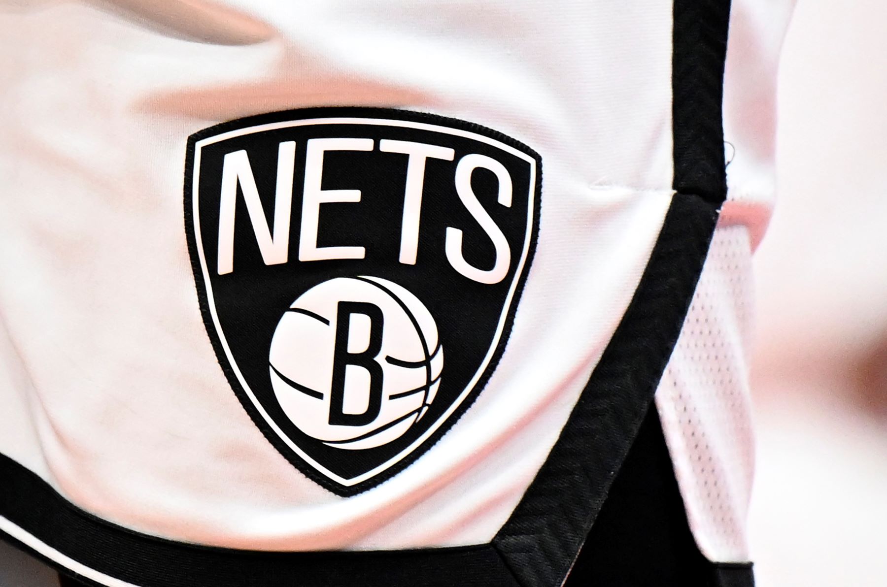 NBA team Brooklyn Nets logo on uniform shorts during a game against the Washington Wizards