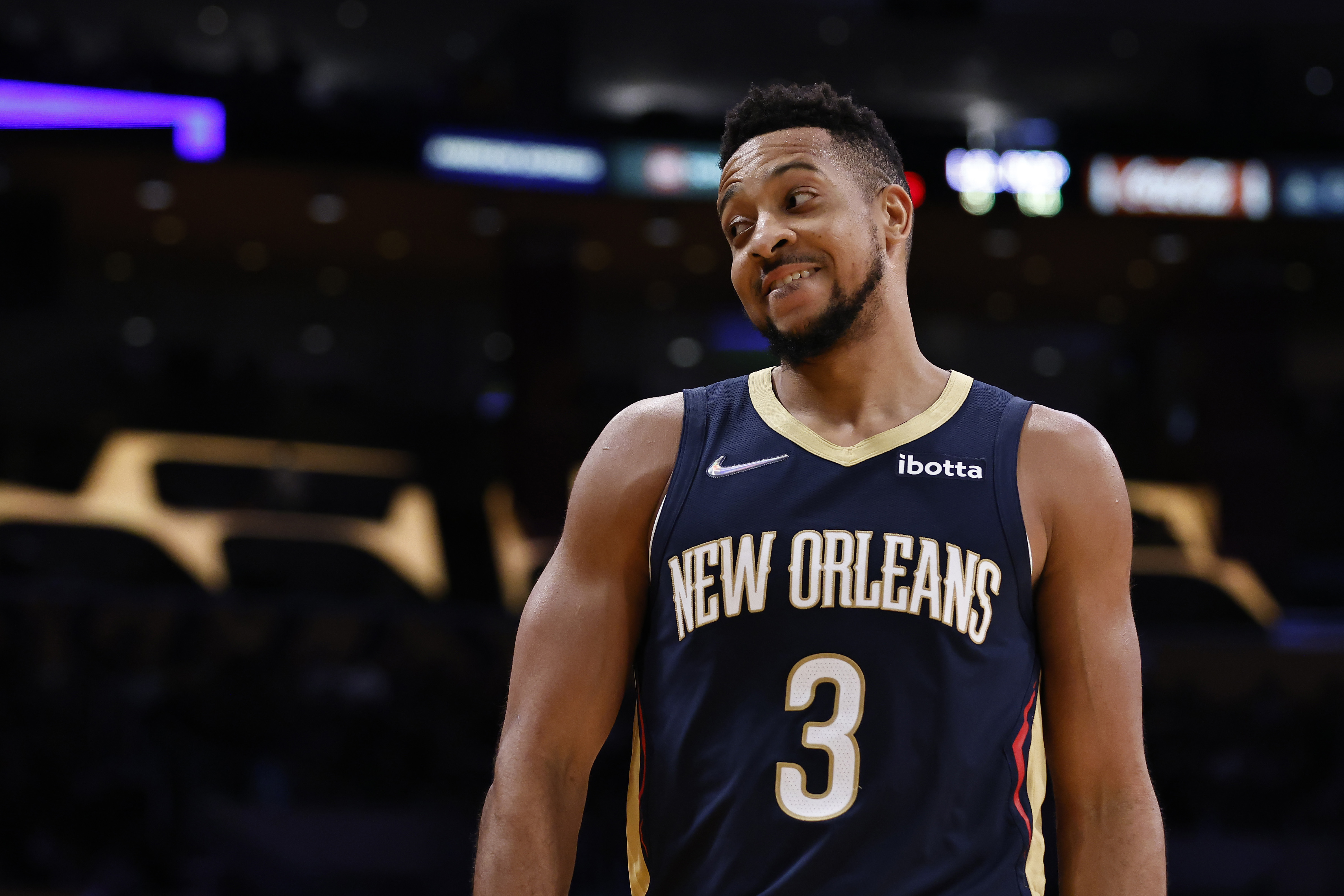 New Orleans Pelicans guard CJ McCollum reacts during an NBA game against the Los Angeles Lakers in February 2022