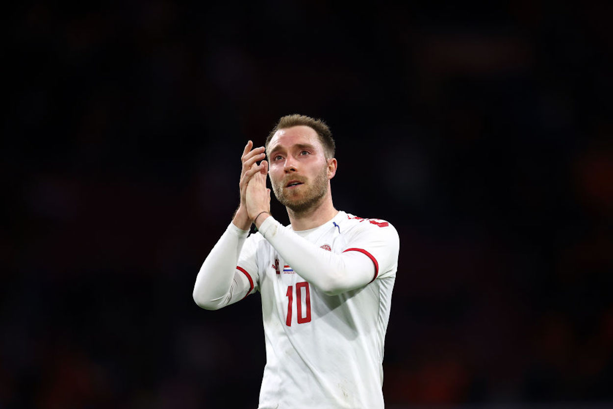 Christian Erikson applaud during a Denmark match.