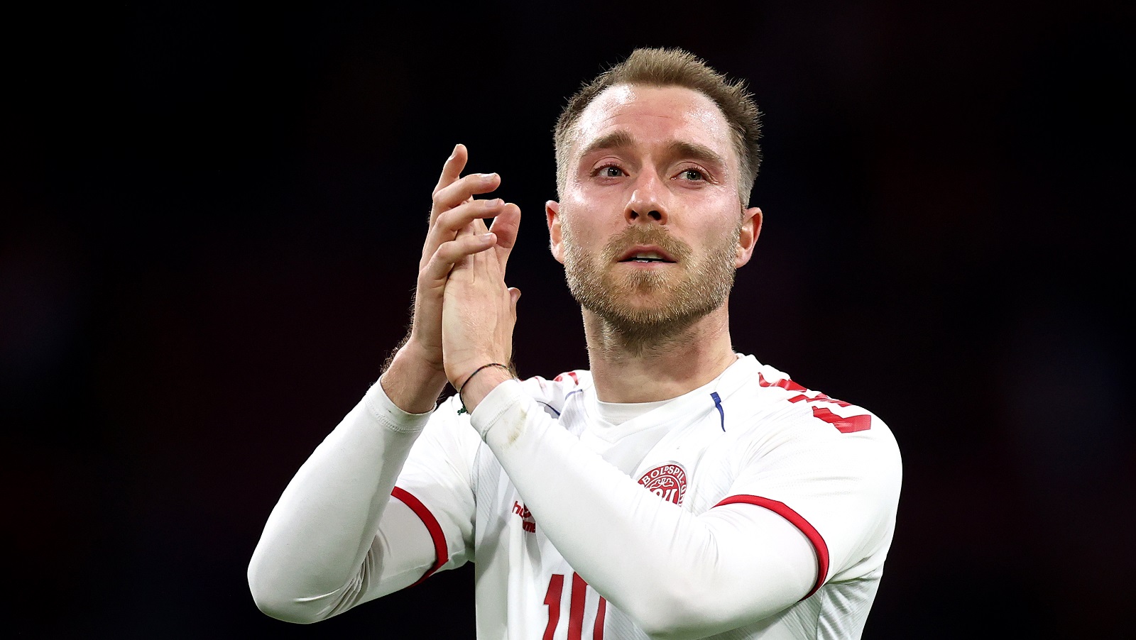 Christian Eriksen of Denmark applauds fans after a loss in an International friendly against the Netherlands on March 26, 2022, in Amsterdam.