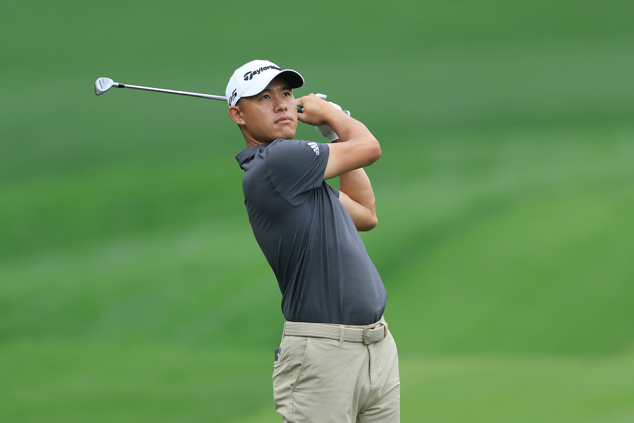 Collin Morikawa hits an iron shot at The Players Championship.