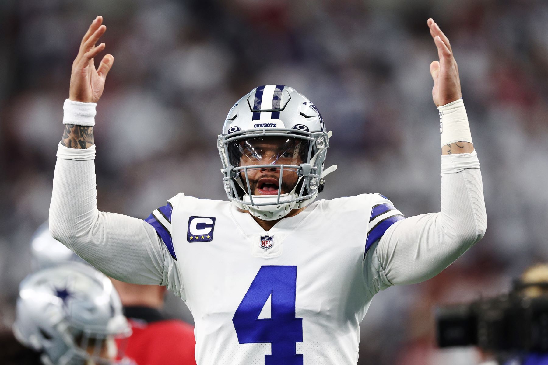 Quarterback Dak Prescott #4 of the Dallas Cowboys NFL team warming up before a game against the San Francisco 49ers