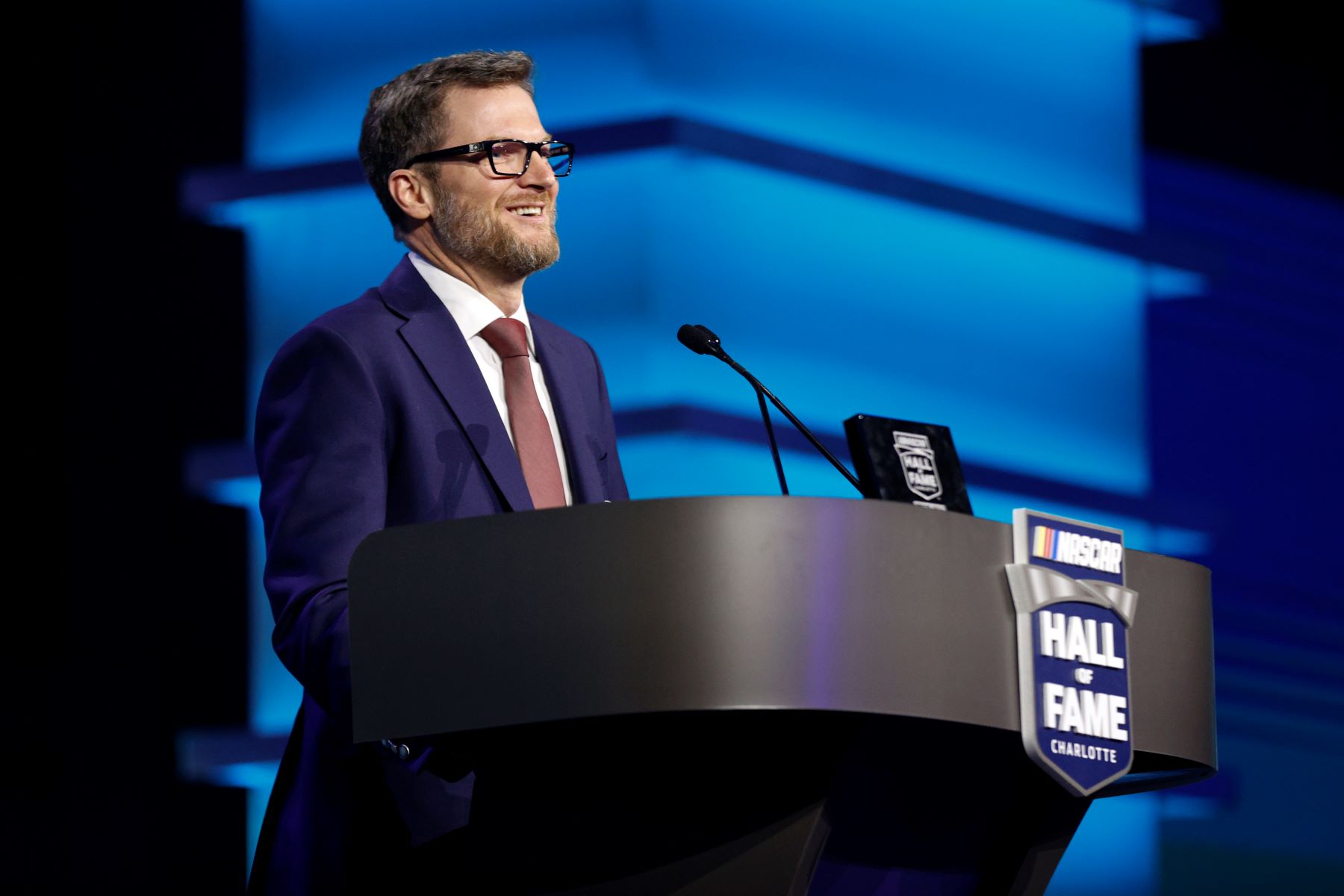 Dale Earnhardt Jr. speaking during the NASCAR Hall of Fame induction ceremony