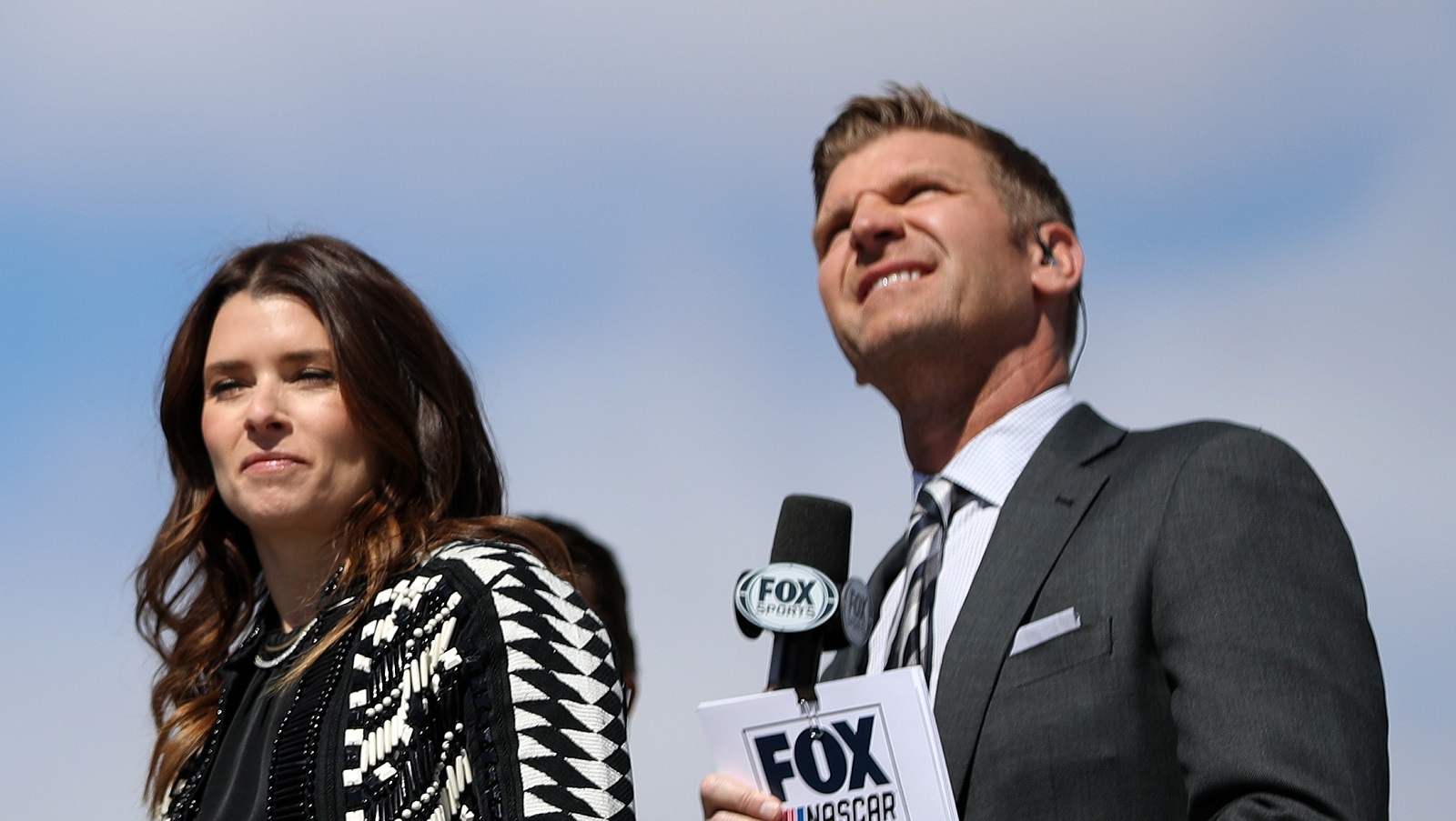 Fox Sports commentators Danica Patrick and Clint Bowyer look on during ceremonies prior to the NASCAR Cup Series Pennzoil 400 at Las Vegas Motor Speedway on March 6, 2022.