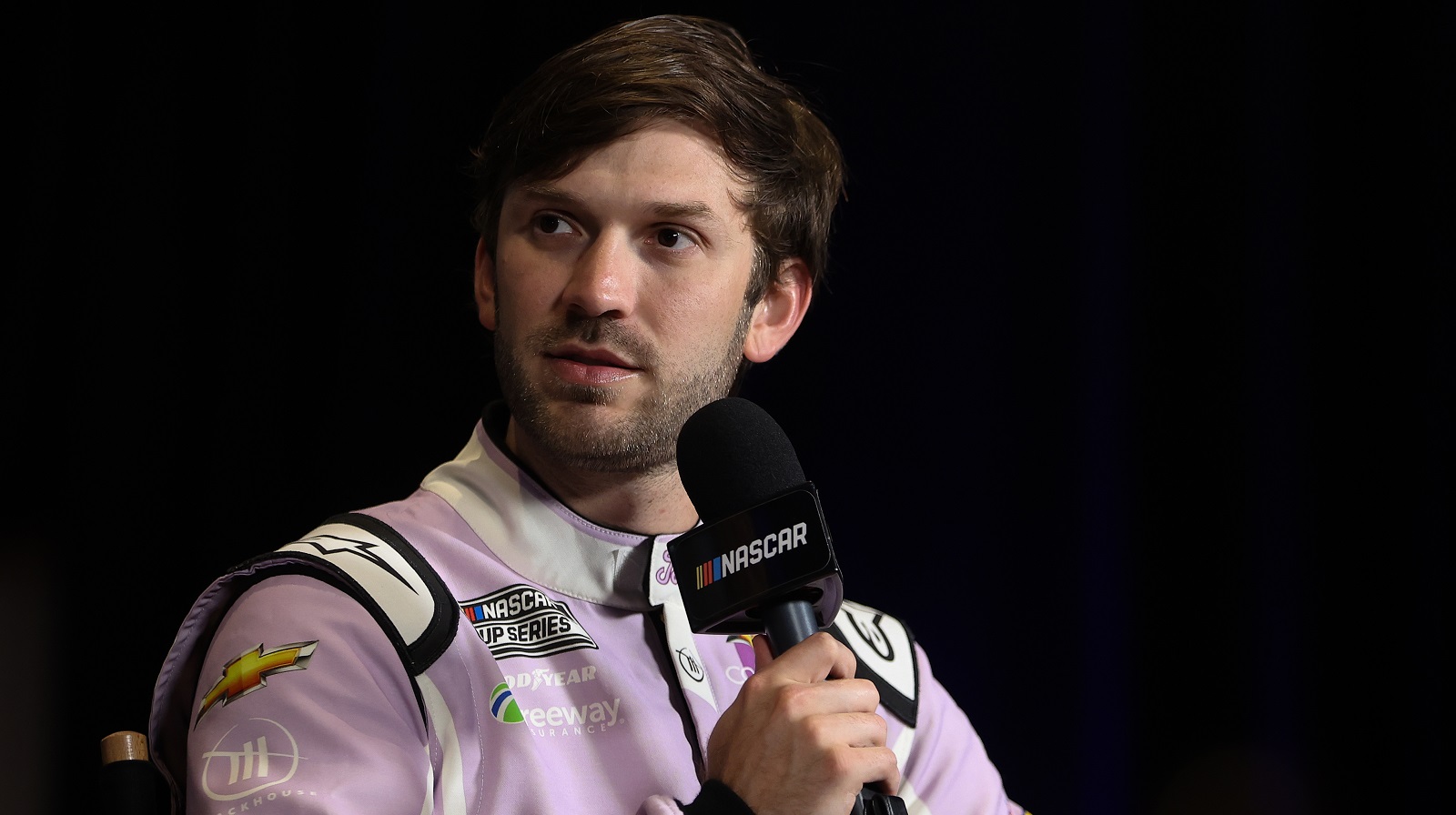 Daniel Suarez, driver of the No. 99 Chevrolet, speaks to the media ahead of the Daytona 500 at Daytona International Speedway on Feb. 16, 2022.