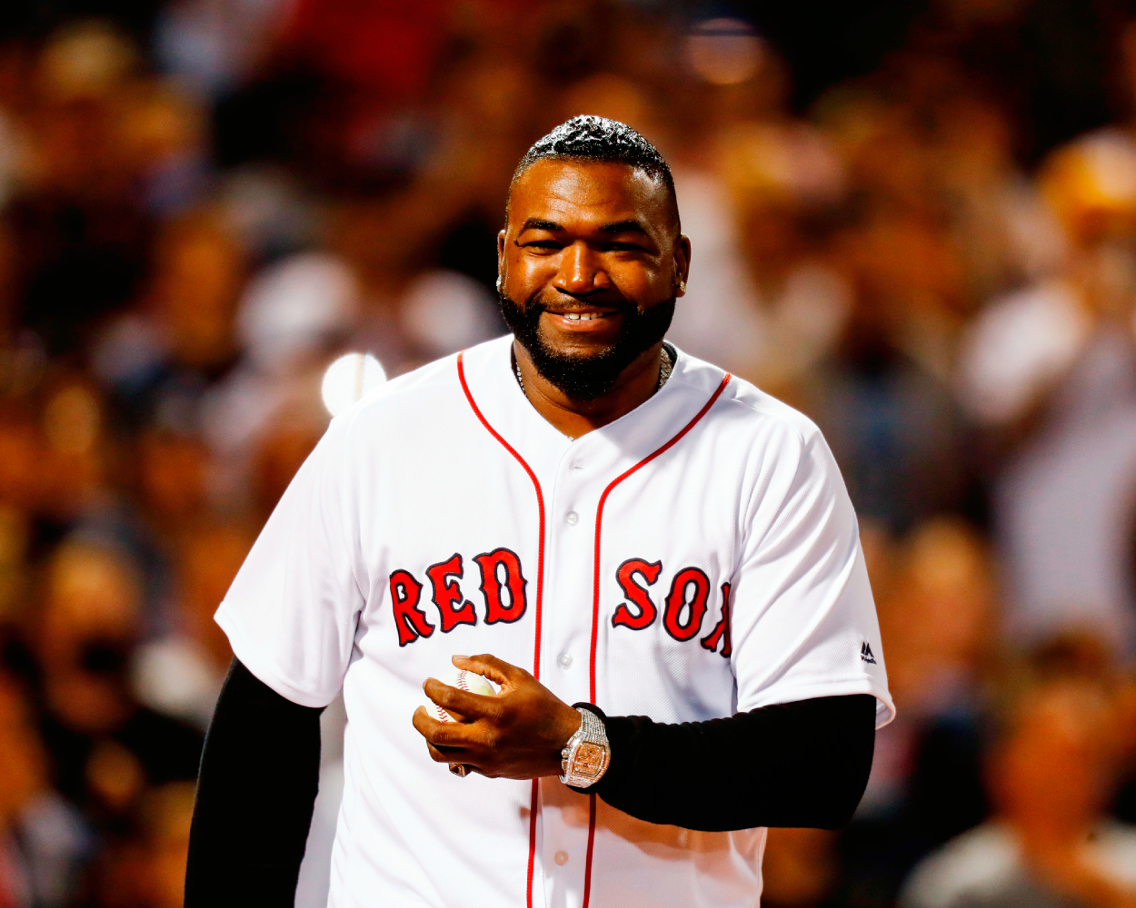 Former Boston Red Sox great David Ortiz reacts before the game between the Boston Red Sox and the New York Yankees at Fenway Park on September 26, 2021, in Boston, Massachusetts.
