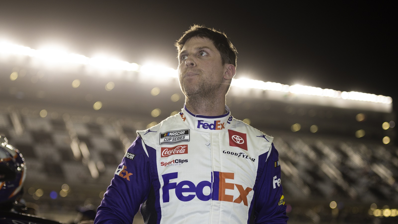 Denny Hamlin, driver of the No. 11 Toyota, waits on pit lane during qualifying for the NASCAR Cup Series Daytona 500 at Daytona International Speedway on Feb. 16, 2022.