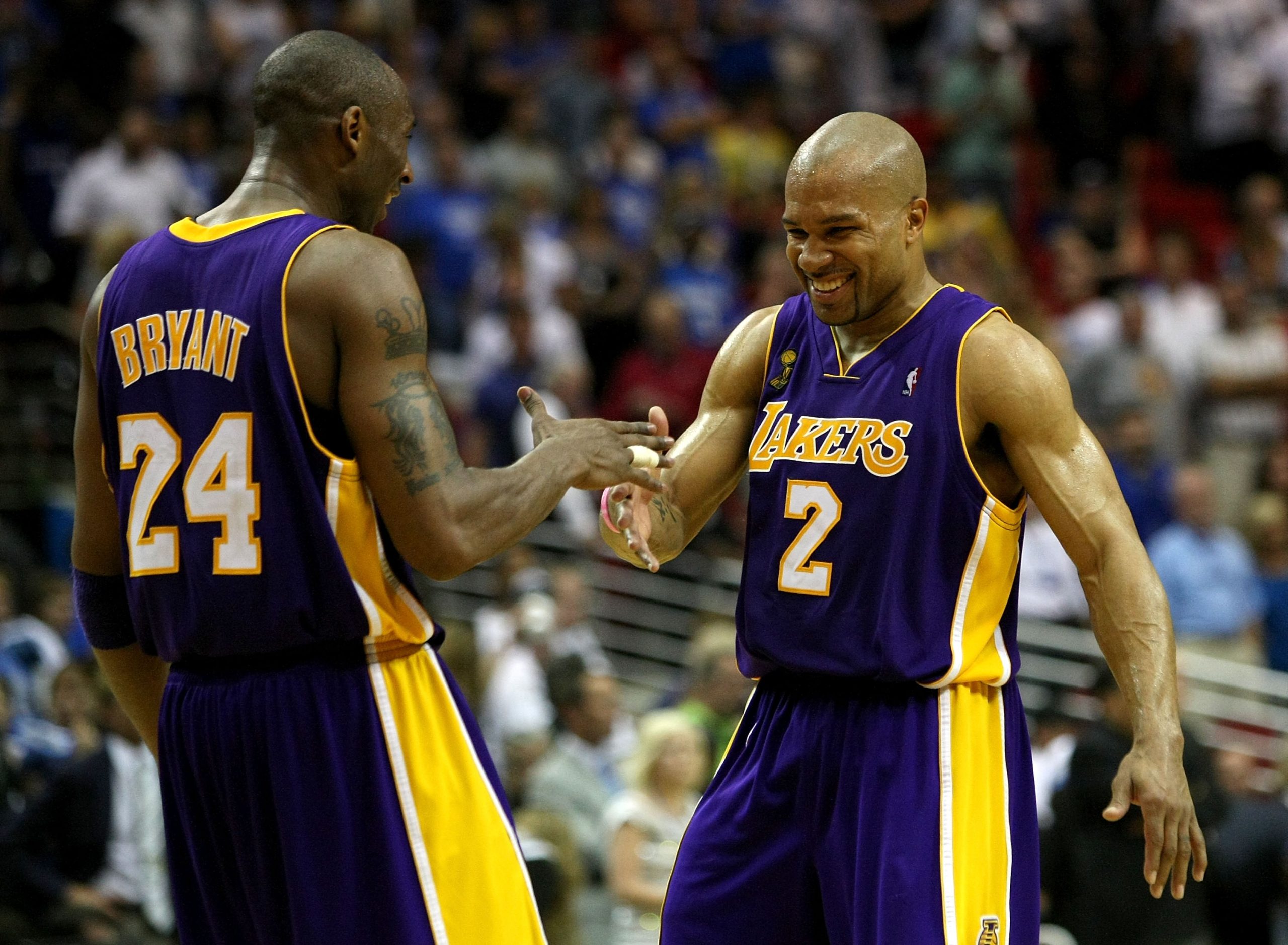 Kobe Bryant, left, and Derek Fisher of the Los Angeles Lakers celebrate.