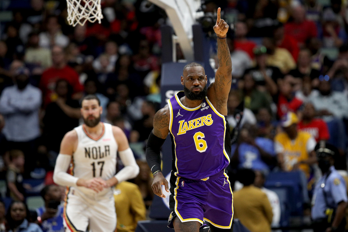 Los Angeles Lakers star LeBron James points to the sky.