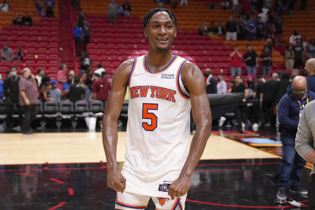 Immanuel Quickley of the New York Knicks celebrates after winning a game against the Miami Heat