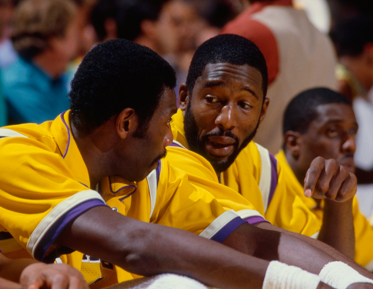 Los Angeles Lakers James Worthy talks with Bob McAdoo during 1985 NBA Finals between Los Angeles Lakers and Boston Celtics.