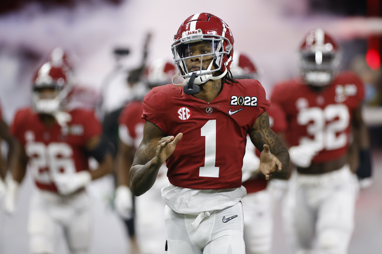 NFL draft prospect Alabama WR Jameson Williams runs onto the field for the CFP National Championship in 2022.
