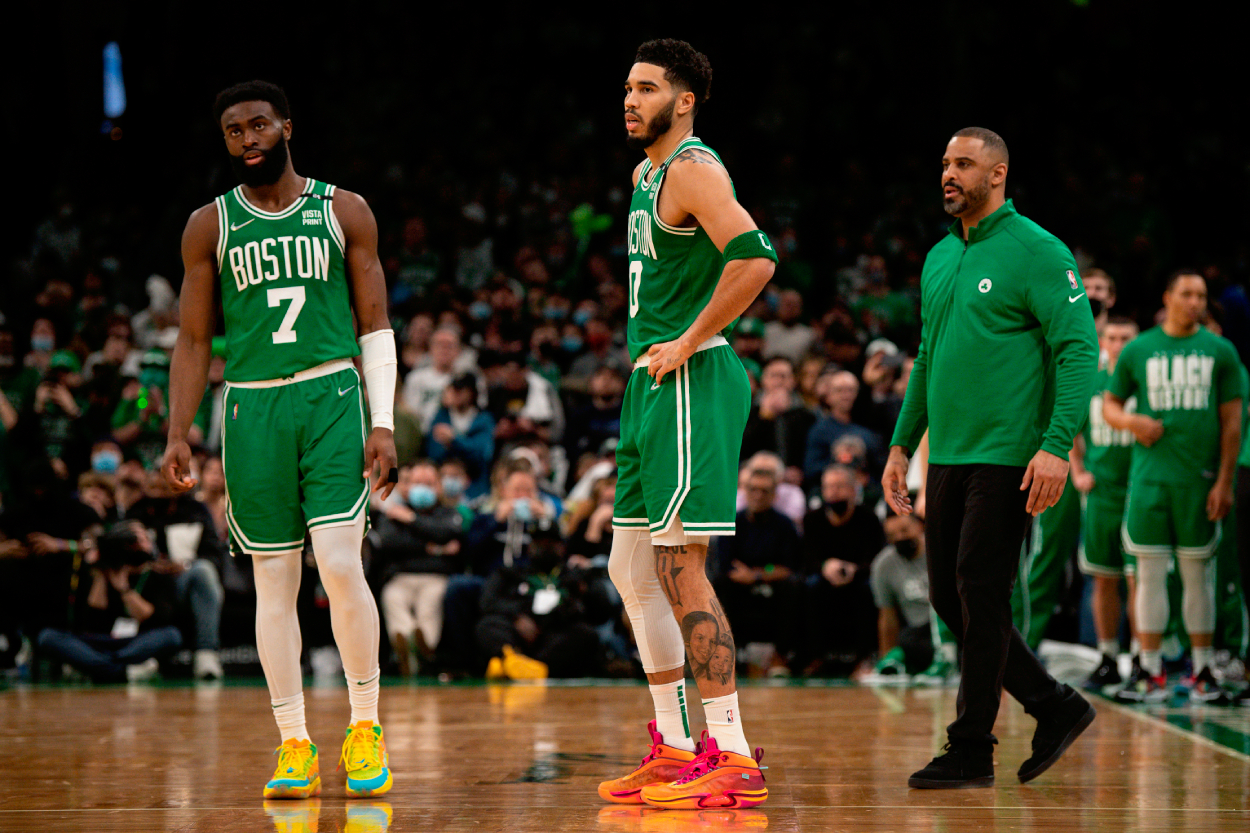 Jaylen Brown, left, of the Boston Celtics and Jayson Tatum of the Boston Celtics look on during the first half of a game against the Denver Nuggets.