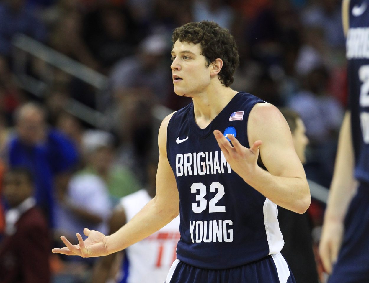 Former BYU Cougars star and 2011 NBA draft pick Jimmer Fredette reacts during an NCAA Tournament game