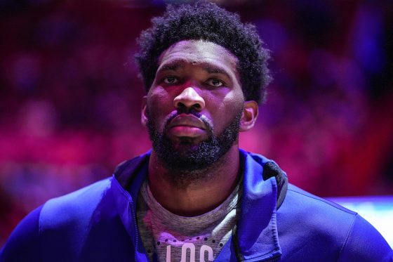 Joel Embiid looks on against the Miami Heat.