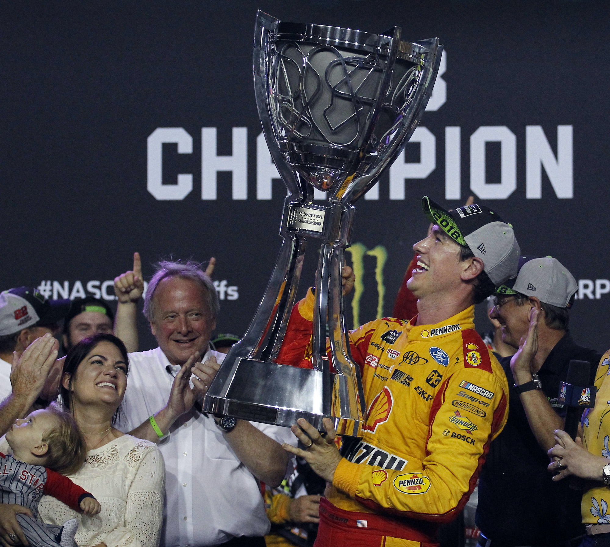 Joey Logano with trophy