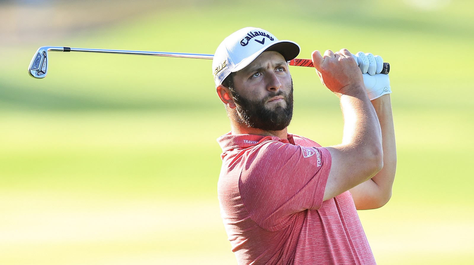 Jon Rahm plays his second shot on the par 4, 18th hole during the third round of The Players Championship at TPC Sawgrass on March 14, 2022.