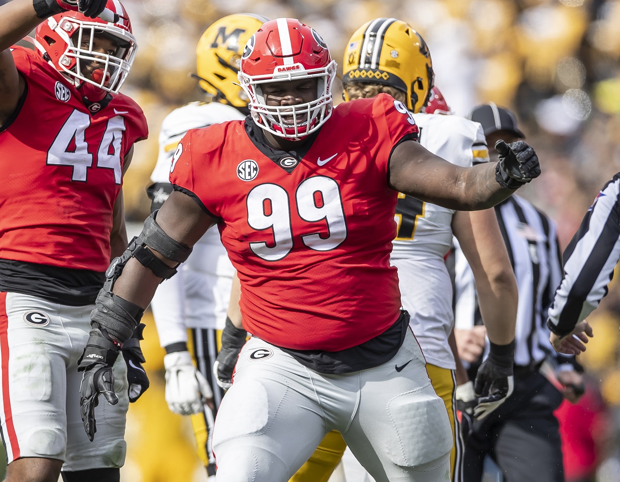 Jordan Davis, potentially next to Khalil Mack?