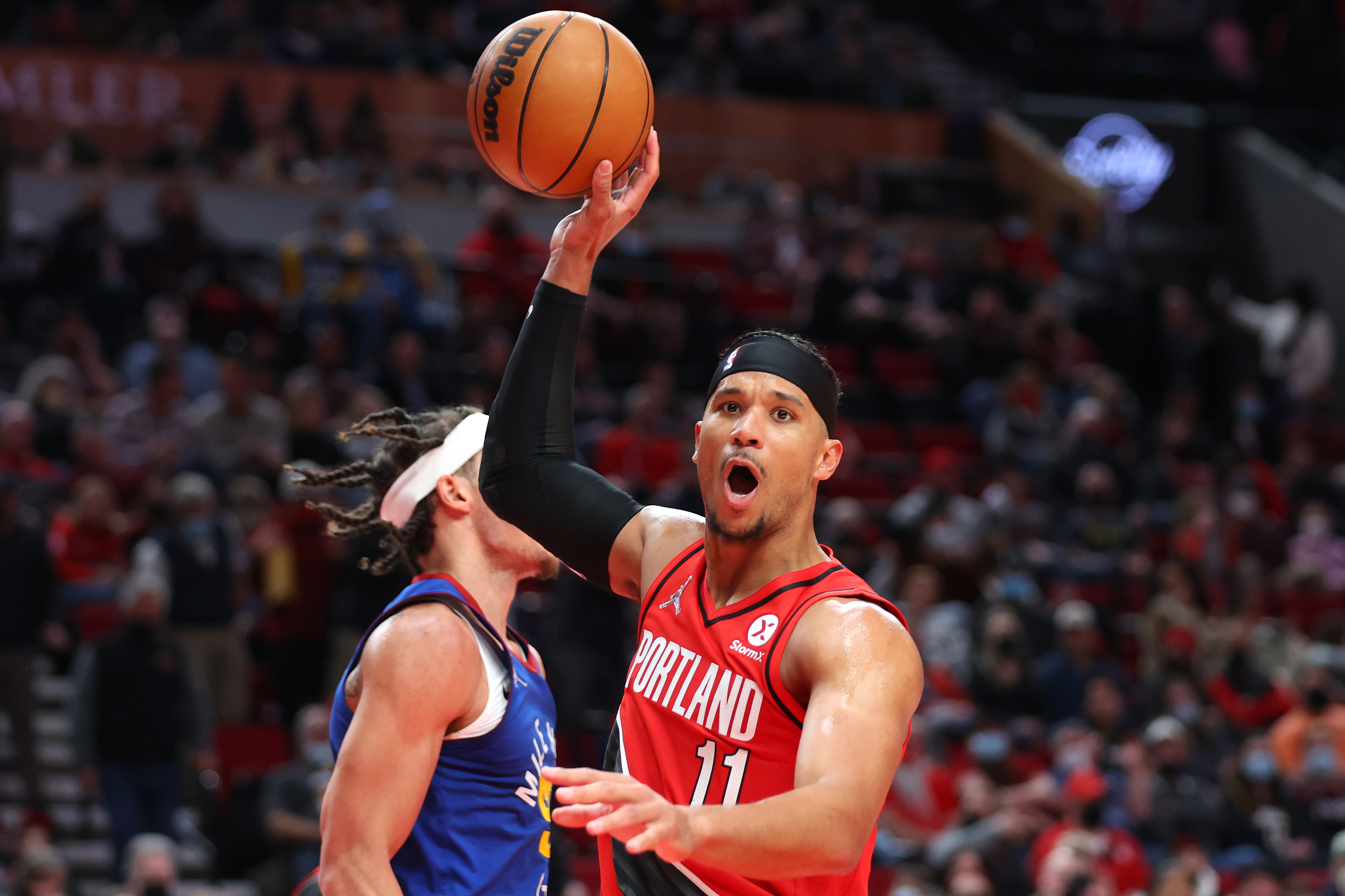 Portland Trail Blazers guard Josh Hart reacts during an NBA game against the Denver Nuggets in February 2022