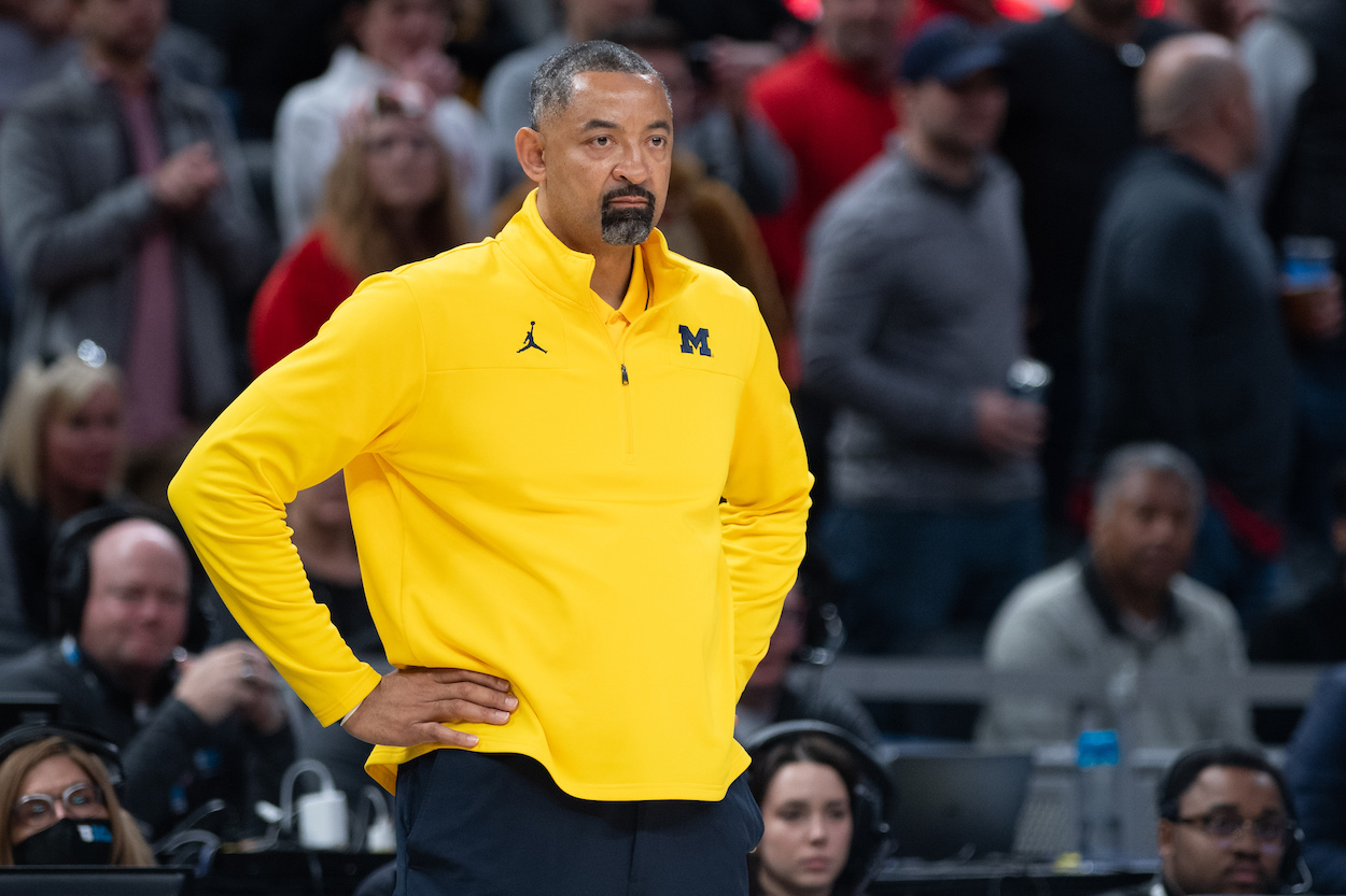 Juwan Howard watches from the sidelines.