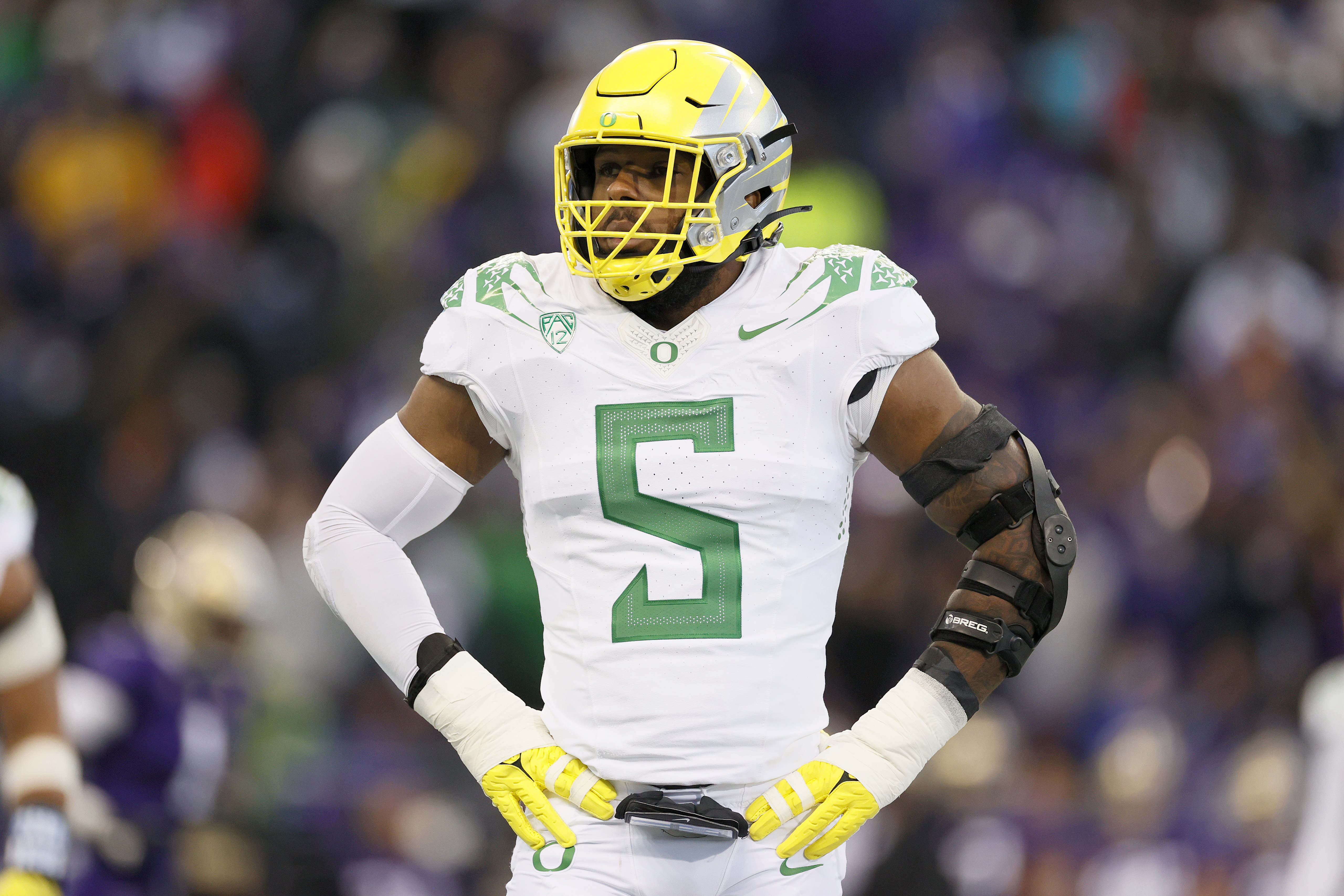 NFL Draft prospect Kayvon Thibodeaux looks on during game against Washington