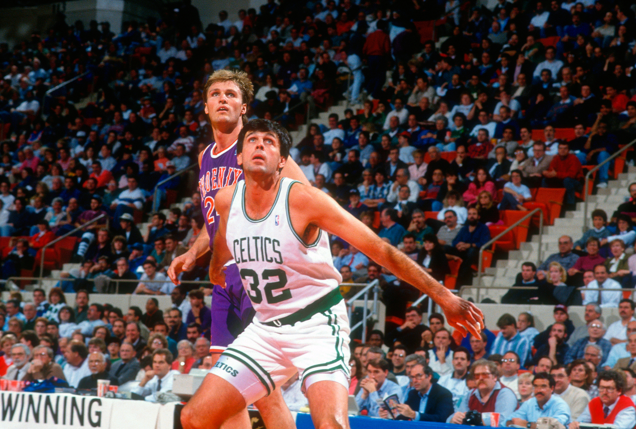 Kevin McHale of the Boston Celtics battles for position with Tom Chambers of the Phoenix Suns.