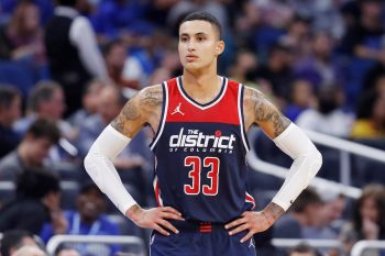 Wizards forward Kyle Kuzma reacts to a play during a game.