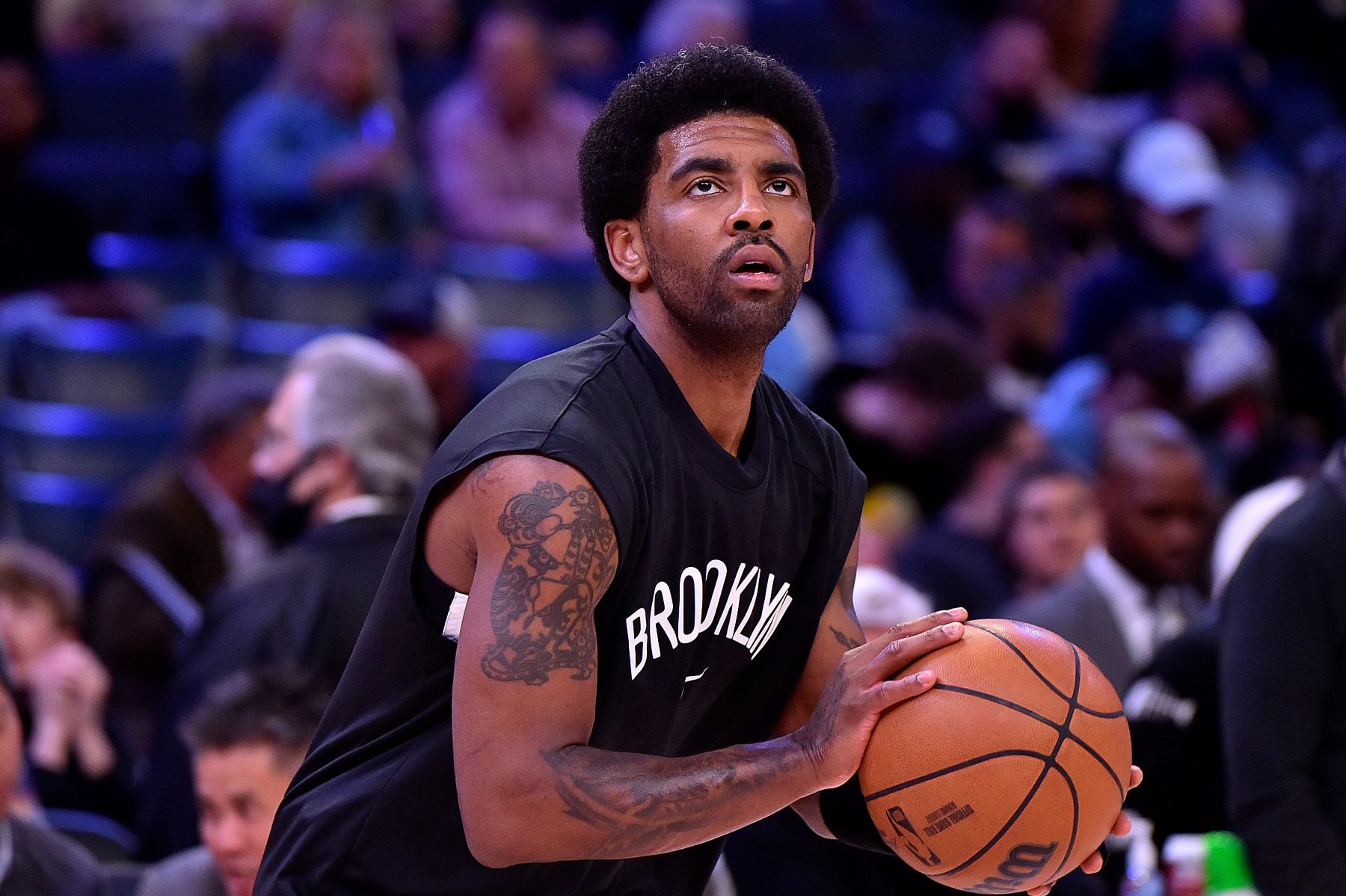 Kyrie Irving as #11 of the Brooklyn Nets NBA team during a game against the Memphis Grizzlies