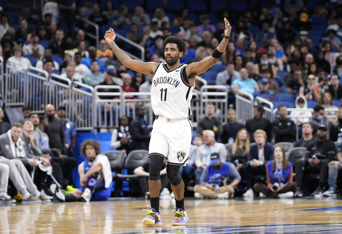 Brooklyn Nets guard Kyrie Irving celebrates against the Orlando Magic.