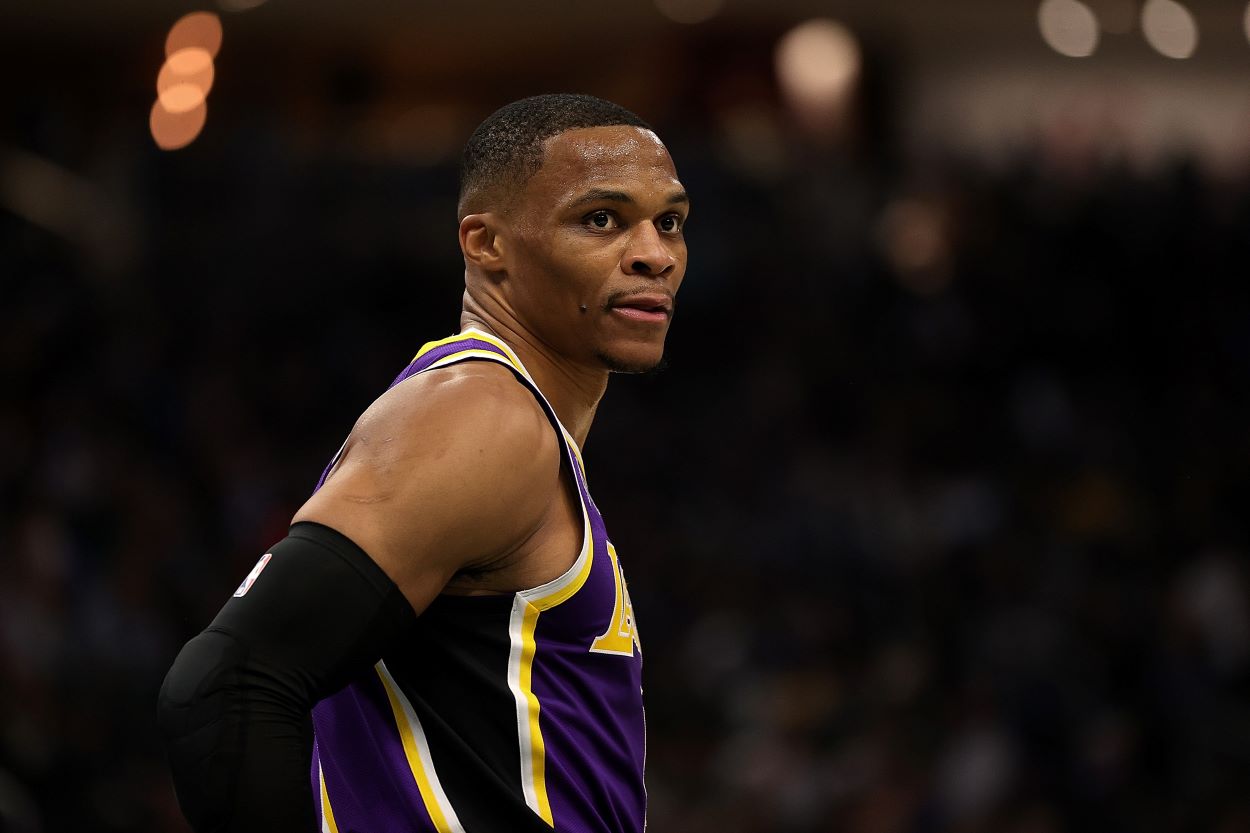 Lakers point guard Russell Westbrook reacts to a play during an NBA game.