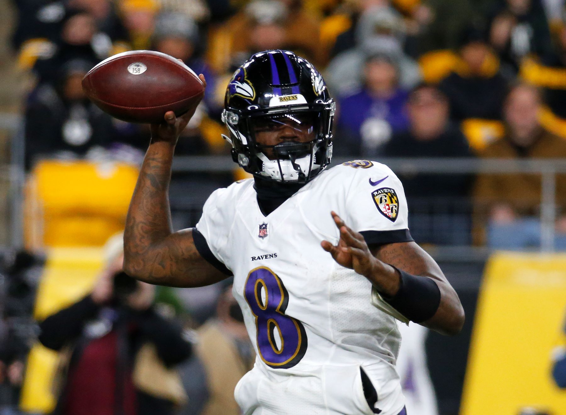 Quarterback Lamar Jackson as #8 on the Baltimore Ravens team of the NFL during a game against the Pittsburgh Steelers