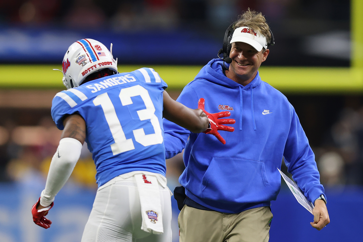 Ole Miss head coach Lane Kiffin and receiver Braylon Sanders in 2022.
