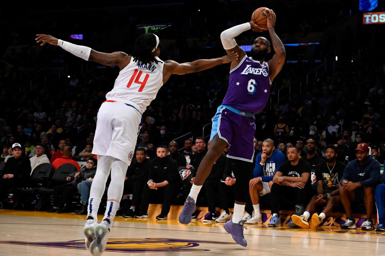 Lakers forward LeBron James attempts a jump shot during a game against the Clippers.