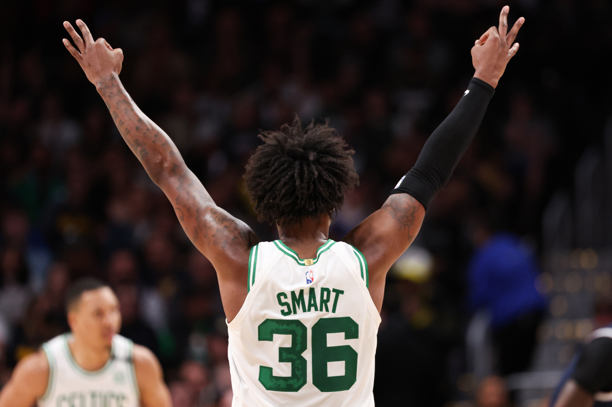 Marcus Smart of the Boston Celtics celebrates against the Denver Nuggets.