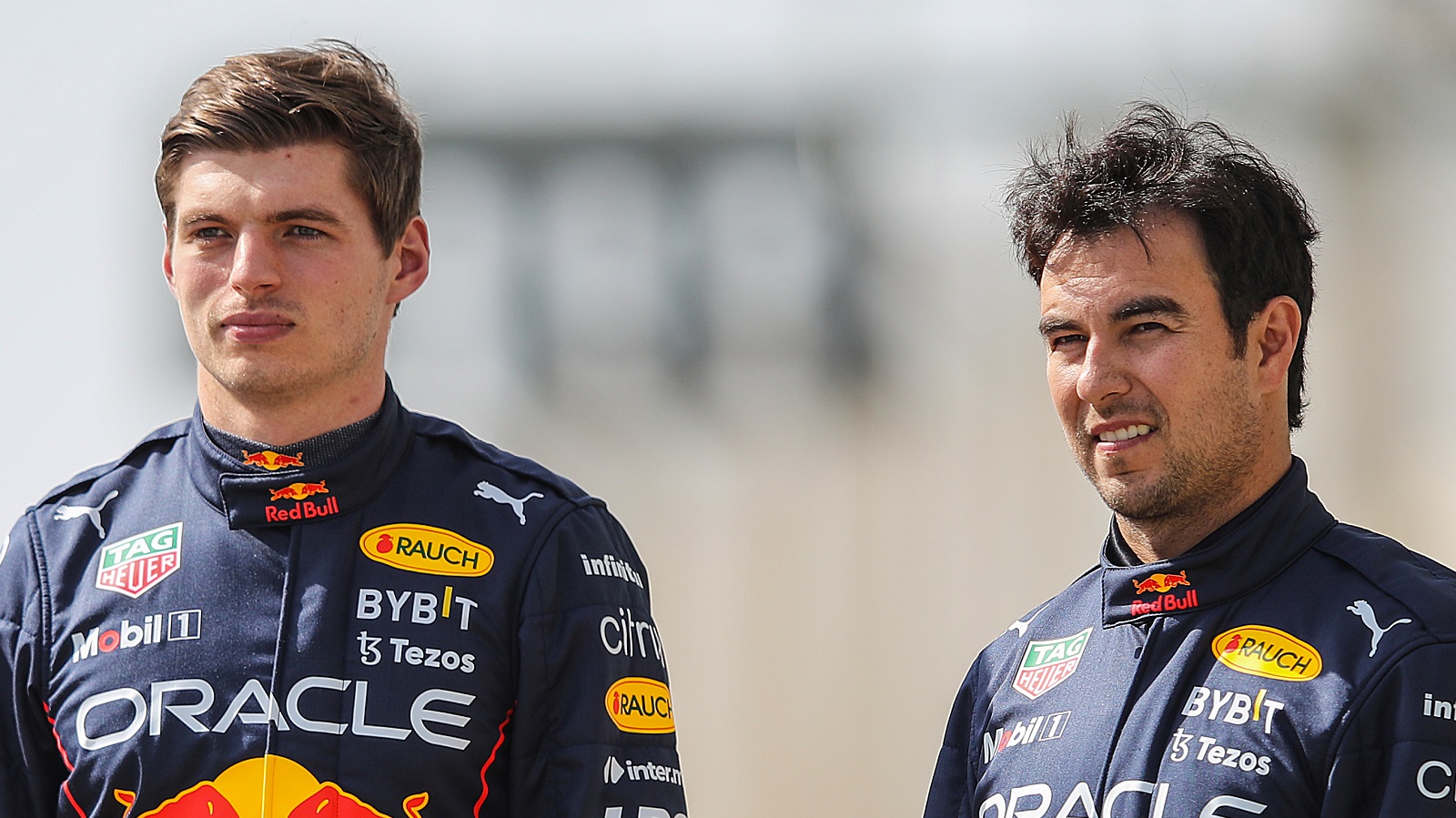Max Verstappen of the Netherlands and Sergio Perez of Mexico pose for a photo during Formula 1 testing at Bahrain International Circuit on March 10, 2022.